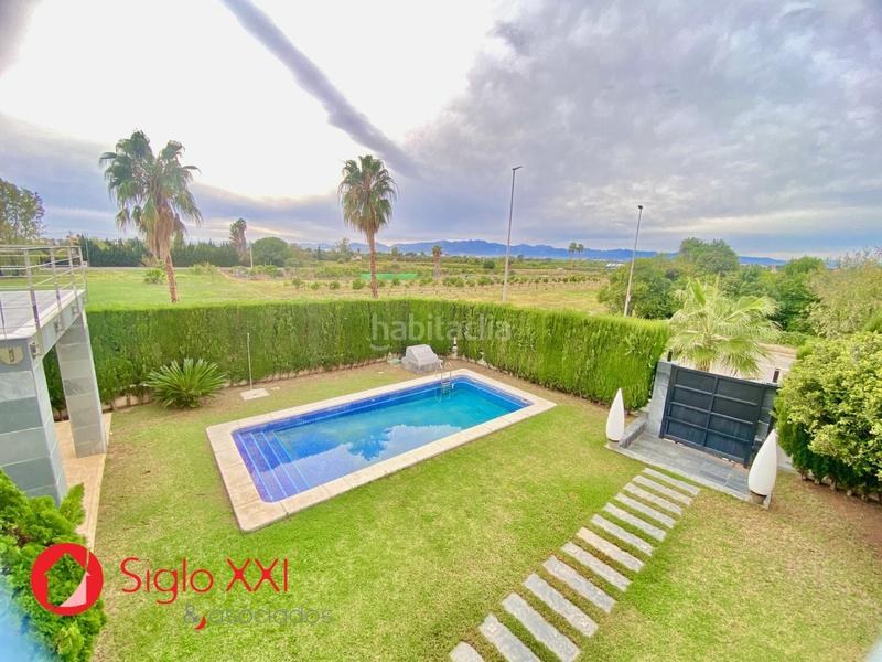 Foto 2792e399-dc34-457e-b9a3-c9b3b20330ac. Chalet avec chauffage parking piscine dans Playa Burriana