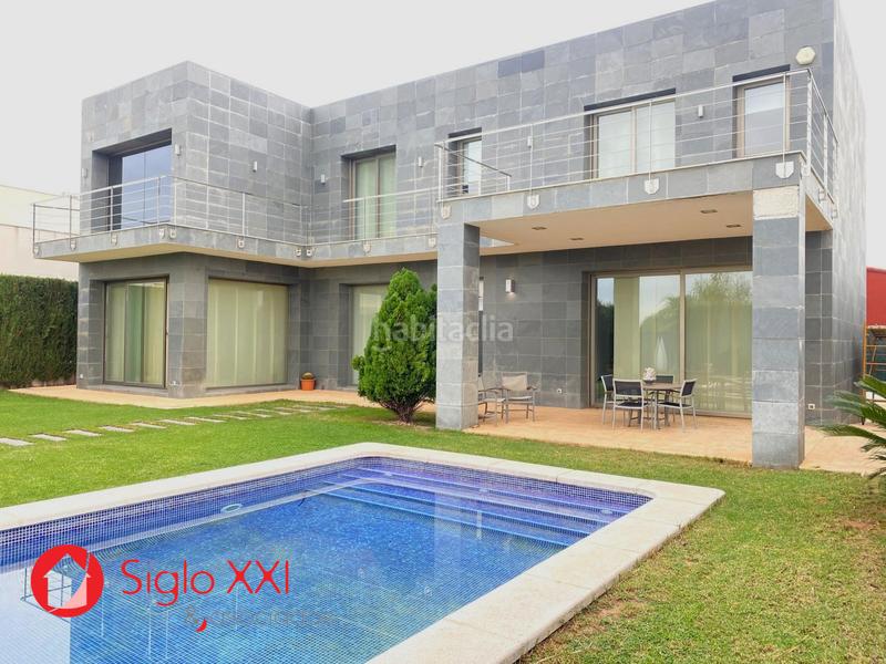 Foto 2be21020-159d-46a8-be13-21e9a5a6b725. Chalet avec chauffage parking piscine dans Playa Burriana