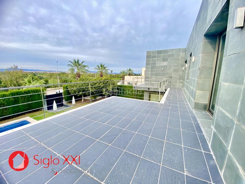 Foto 3cb7bfbc-bc59-4991-98bf-f862d0fdf5e8. Chalet avec chauffage parking piscine dans Playa Burriana