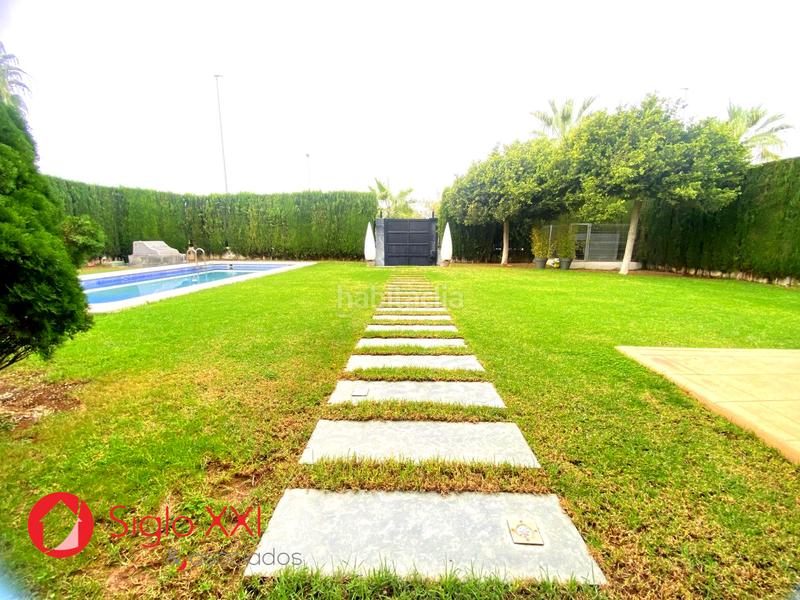 Foto 4e7f5682-2aff-4fb0-ad9c-3d94dbc26aff. Chalet avec chauffage parking piscine dans Playa Burriana