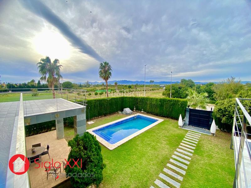 Foto 75c26aba-e33f-4300-a781-4729210aa0c9. Chalet avec chauffage parking piscine dans Playa Burriana