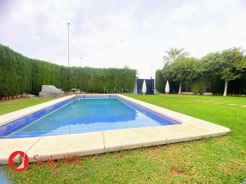 Foto 8ba9c98d-7791-4a0b-8b1c-73e4865cc778. Chalet avec chauffage parking piscine dans Playa Burriana