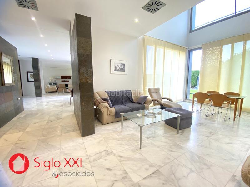 Foto c6e2e583-5144-429a-bc63-7a827d655eaf. Chalet avec chauffage parking piscine dans Playa Burriana