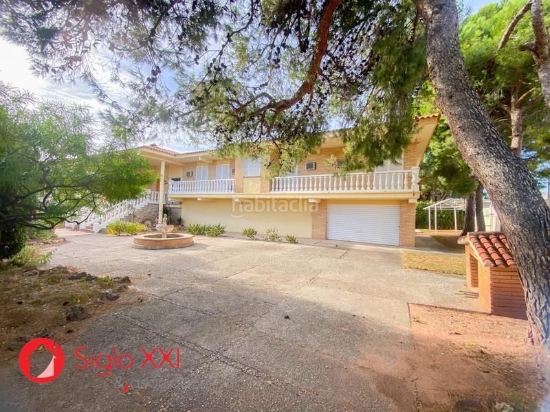 Foto 4441fba1-fcd8-4c59-9819-6021a62f9ada. Chalet descubre la majestuosidad de este chalet excepcional, situado en una parcela de 1844 m2 que se presenta como un verdadero paraíso. en Benicasim / Benicàssim
