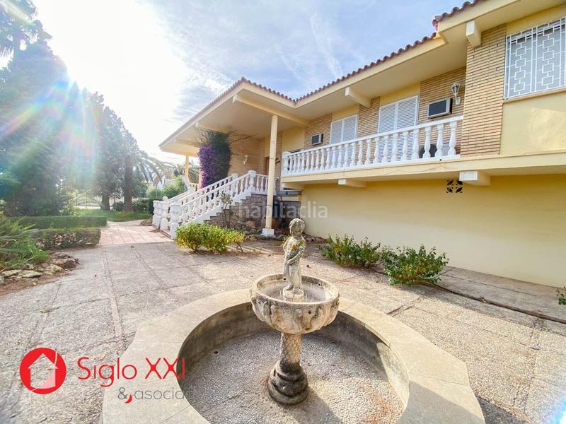 Foto 8512b686-e244-4b61-a3ba-3788eb6b8dce. Chalet descubre la majestuosidad de este chalet excepcional, situado en una parcela de 1844 m2 que se presenta como un verdadero paraíso. en Benicasim / Benicàssim