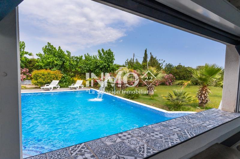 Foto a7cc485c-b80a-454e-ad02-06865fe01da7. Casa impresionante villa privada a metros de cambrils con piscina privada, apartamento privado y terreno de casi 1700m2 a 1 km del mar. en Vinyols i els Arcs
