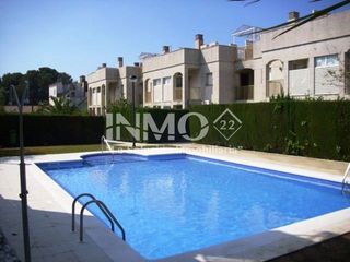 Apartament  Carrer saturn. Apartamento de dos habitaciones planta baja con jardin y piscina