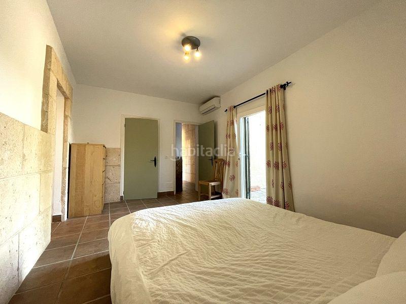 Foto c5c7dcce-d3eb-4492-b44f-0e79ce266e91. Masia amb calefacció piscina a Llucmajor interior Llucmajor