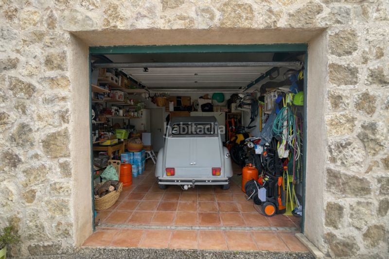 Foto 495f613f-124a-4021-994d-3fc1c9baecf5. Chalet with fireplace heating parking pool in Porreres