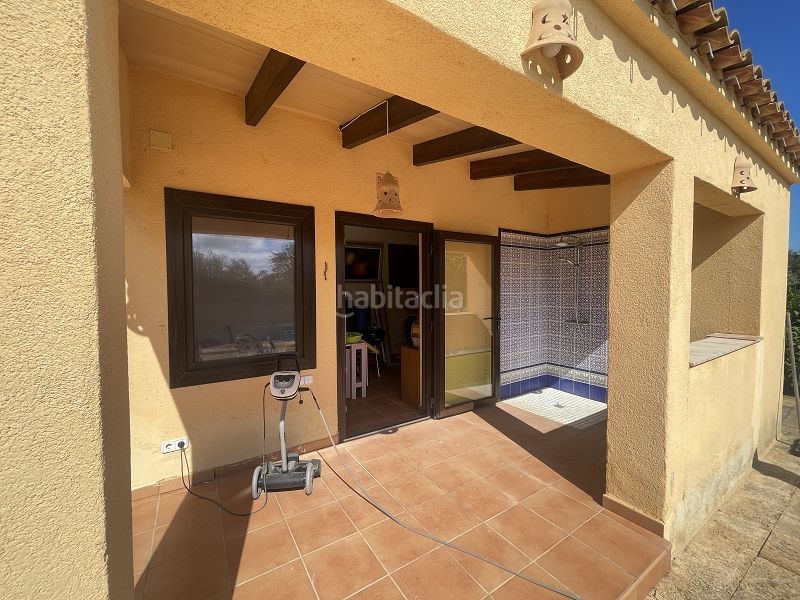 Foto dc934660-0c39-4131-afcb-233b85024297. Chalet with fireplace heating parking pool in Porreres