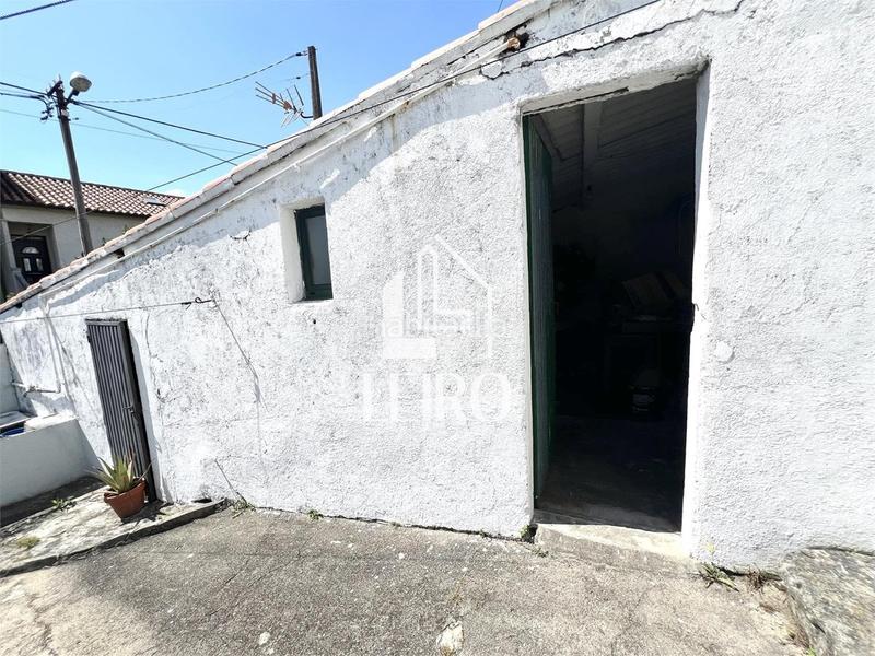 Foto 5a35b05f-78c9-47f0-b7bb-6357ab33f920. Casa  a reformar con jardín y garaje - en O Carril Vilagarcía de Arousa