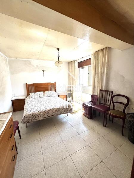 Foto 79ecc892-1218-46c3-b26f-c5fb90f7b668. Casa  a reformar con jardín y garaje - en O Carril Vilagarcía de Arousa