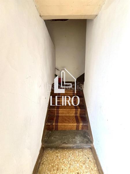 Foto 8ad08e18-f2e4-4e11-9b10-e24f94774165. Casa  a reformar con jardín y garaje - en O Carril Vilagarcía de Arousa