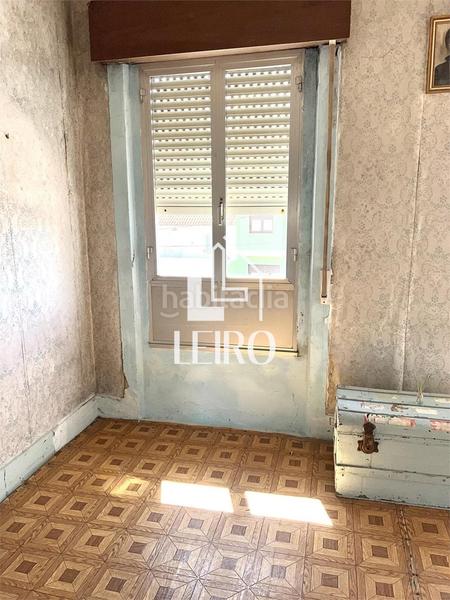 Foto ce0be461-02ac-47a6-9a6a-8d87e2c34885. Casa  a reformar con jardín y garaje - en O Carril Vilagarcía de Arousa