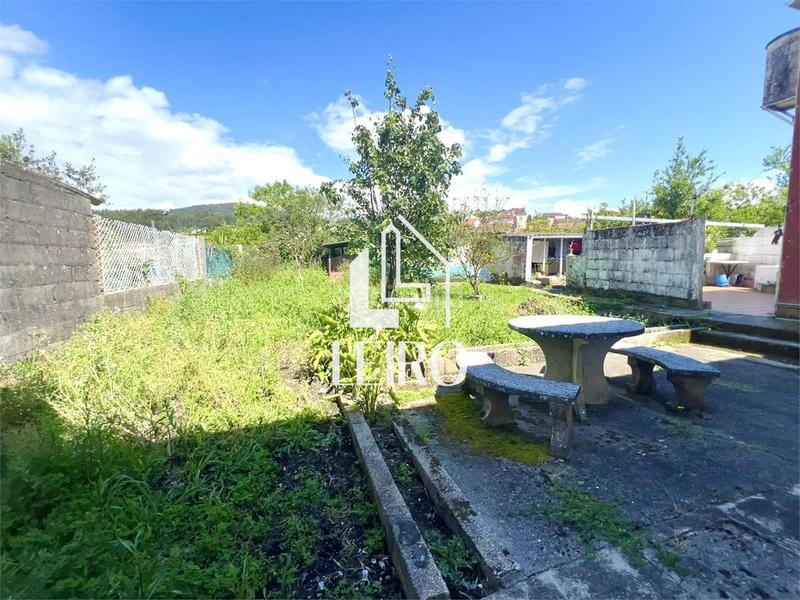 Foto d6dc5cf5-ab45-4ba4-b570-61c796126fdb. Casa  a reformar con jardín y garaje - en O Carril Vilagarcía de Arousa