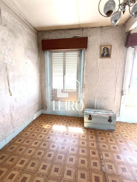 Foto e5b0755f-a7ad-44ce-9377-fdd45ba46625. Casa  a reformar con jardín y garaje - en O Carril Vilagarcía de Arousa