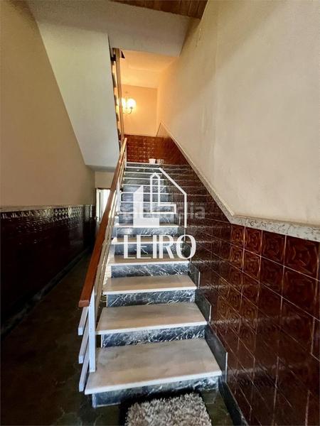 Foto f084cb7c-31f9-4c3a-b70d-8d84874a1e5f. Edifici a Cuntis