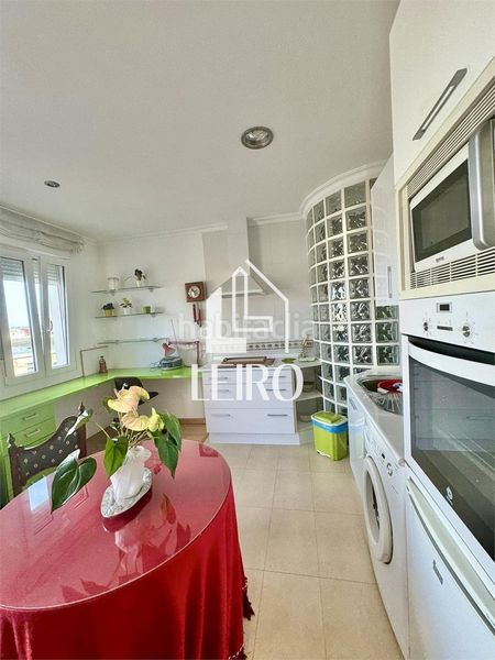 Foto b3600bd7-35b0-43db-a447-08ca383effca. Casa pareada en Illa de Arousa (A)