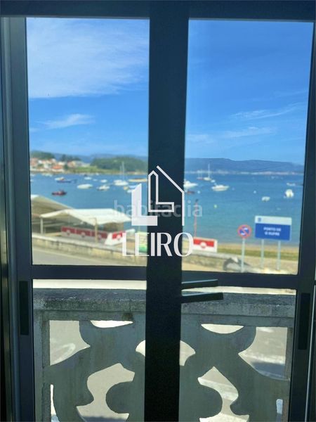 Foto fcf6a84c-5912-4dd2-8382-a756996e6020. Casa pareada en Illa de Arousa (A)