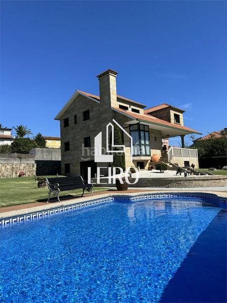 Foto 2bab0d6f-d612-4093-9d73-c335e0ca06b6. Chalet with fireplace parking pool in Poio