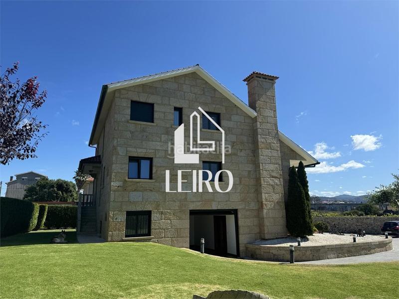 Foto 3208bd11-1dcc-42a5-9796-1712ad949cb3. Chalet with fireplace parking pool in Poio