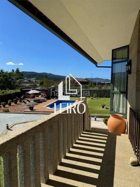 Foto d3ce11cd-9f5b-4b7e-93f3-b165baa25486. Chalet with fireplace parking pool in Poio