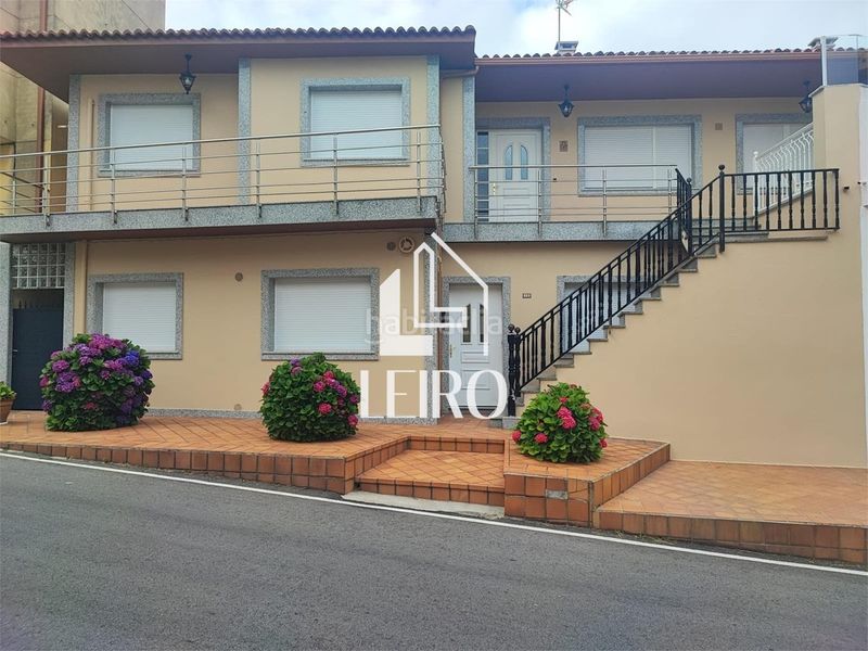 Foto 1f61b204-996c-44f1-85ab-03eeb8c5514f. Maison avec cheminée dans Boiro