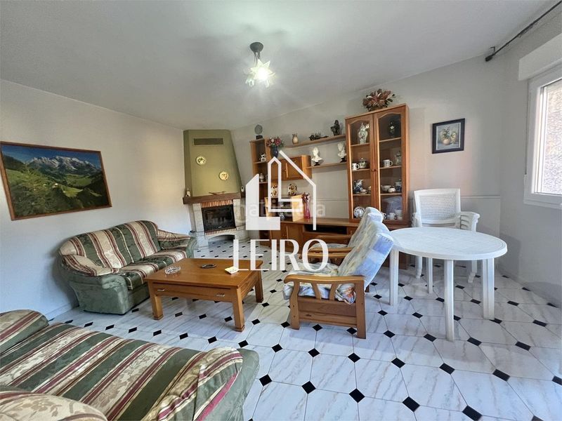 Foto 40cb94a4-a66c-498d-b8e0-b92c2edeb554. Maison avec cheminée dans Boiro