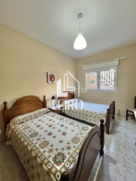 Foto 46e3a7a6-4639-47d2-9c82-1ecca7a72ec4. Maison avec cheminée dans Boiro