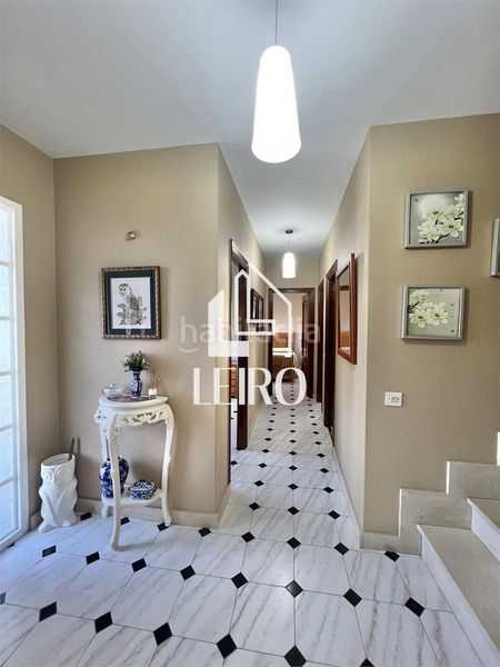 Foto f6eea1b9-c145-4b66-9fef-46899e2de17a. Maison avec cheminée dans Boiro