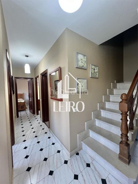 Foto fb0b27fe-a965-4e34-becc-d3e9e65041fe. Maison avec cheminée dans Boiro