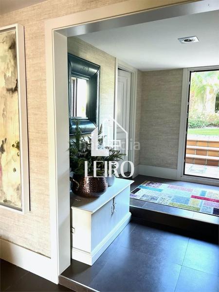 Foto dd621ed5-bf75-475e-b692-d4d217f759b5. Chalet con camino riscaldamento parcheggio piscina in Cambados