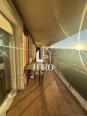 Appartement à O Carril. Apartamento con impresionante terrazaza en urbanización con pisc