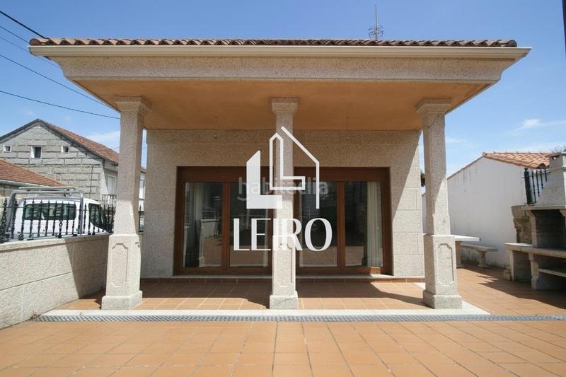 Foto 2c96ed73-6e42-4aa4-b29e-bee8dde09657. Chalet con riscaldamento parcheggio in O Carril Vilagarcía de Arousa