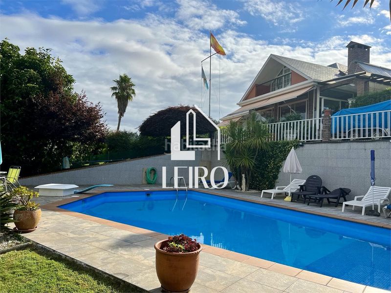Foto b8f525ae-683d-4b58-b74b-aa8a71904da5. Xalet amb xemeneia calefacció aparcament piscina a Vilagarcía de Arousa