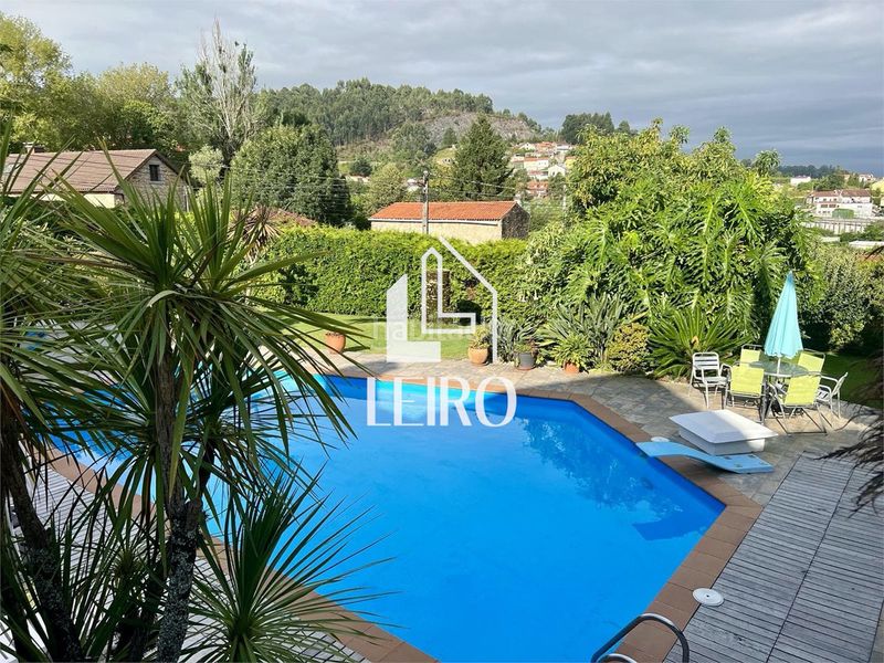 Foto dcdd1a6a-ca4e-4cdc-8705-ce69507fd72b. Xalet amb xemeneia calefacció aparcament piscina a Vilagarcía de Arousa
