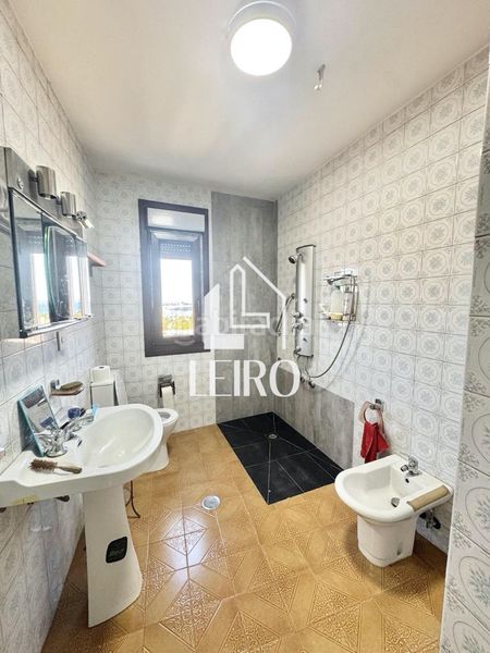 Foto 32492c2e-973d-42c5-ae4d-c104d163ce8b. Casa amb aparcament a Vilagarcía Vilagarcía de Arousa