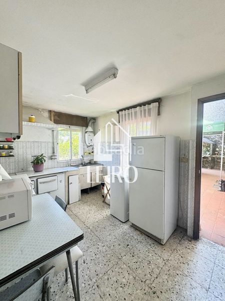 Foto 2d547944-abb6-43c7-b89e-a5de3d0c77a8. Casa amb xemeneia calefacció a Vilanova de Arousa