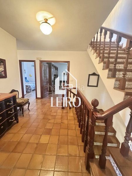 Foto dc91a0cb-f081-4049-8229-d75b1e8f1f66. Casa amb xemeneia calefacció a Vilanova de Arousa