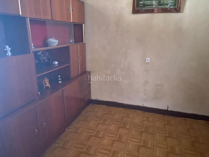 Foto dd53cada-885c-42bd-b2a0-d1d7b9374b93. Casa adossada a Lalín