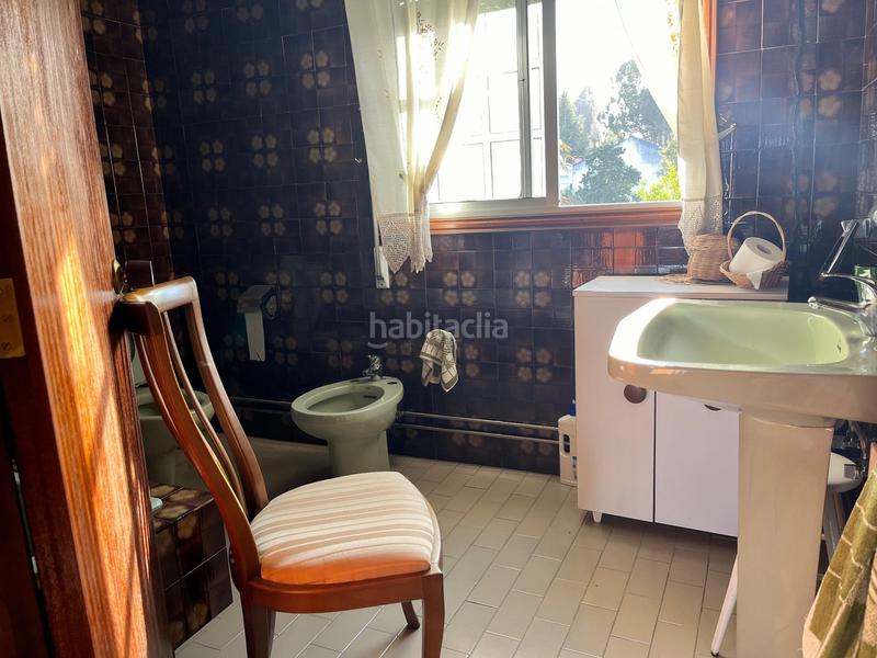 Foto 2b9ca587-be5d-4aec-80f7-6bb9e2fe5a1f. Masía casa con finca y local en el centro de a bandeira en Silleda