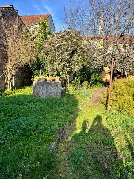 Foto 7af32379-0725-4ae6-bf2e-373ba3021b6d. Masía casa con finca y local en el centro de a bandeira en Silleda