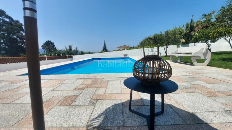 Foto 1a590f66-4c59-401f-a4a6-985ae86d9ec2. Casa  con piscina para entrar a vivir en Camos Nigrán