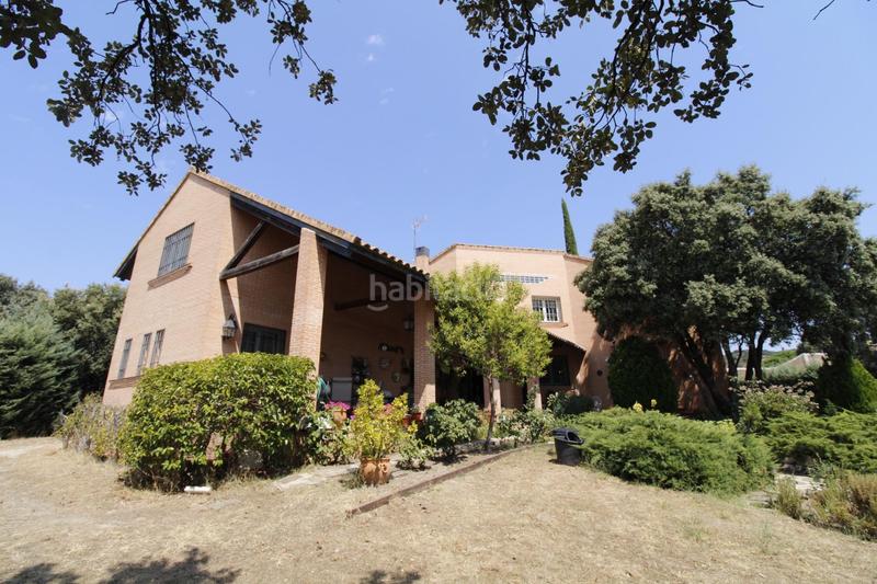 Foto a8119329-bda8-4d54-b350-326a595958e8. Xalet amb calefacció aparcament piscina a Navalquejigo-Los Arroyos Escorial (El)