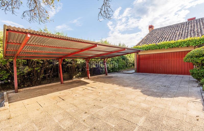 Foto fc62f4a6-d29e-4d39-b1af-ebbd9cbc6250. Maison avec parking piscine dans Navalquejigo-Los Arroyos Escorial (El)