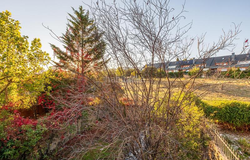 Foto 303efdeb-cd3d-4b4d-88fc-3ce7bc96f575. Casa adossada amb calefacció aparcament a Guadarrama