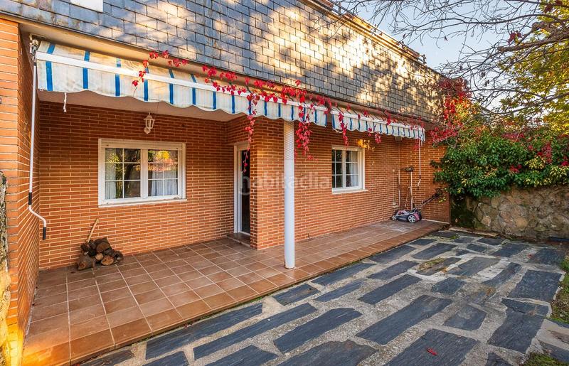 Foto 399393c9-c896-4287-80ed-24d4e0345393. Casa adossada amb calefacció aparcament a Guadarrama