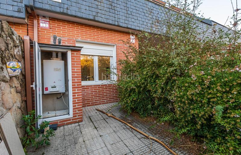 Foto 436c2707-c38c-4fc8-b1c9-7ee6c90d218e. Casa adossada amb calefacció aparcament a Guadarrama