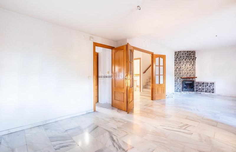 Foto 74ac2dd8-c93b-4748-a5fd-188e2cadc7c3. Casa adossada amb calefacció aparcament a Guadarrama