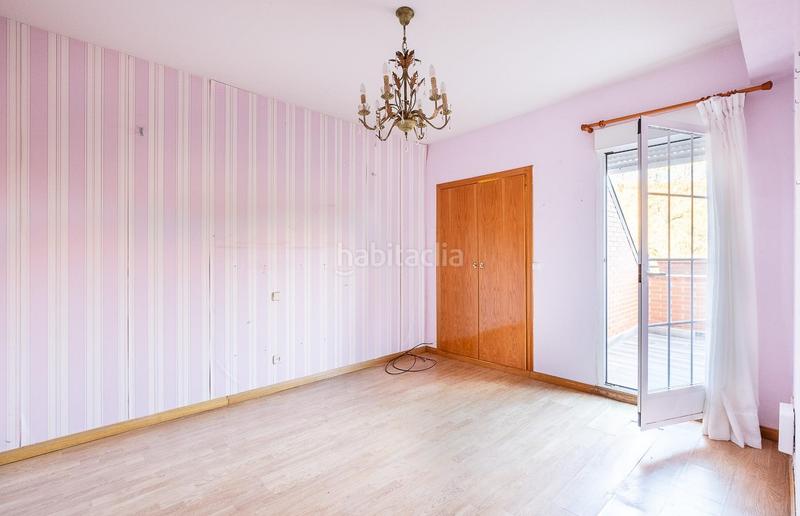 Foto bc5bc664-9159-4254-bc38-2a844c1e895c. Casa adossada amb calefacció aparcament a Guadarrama